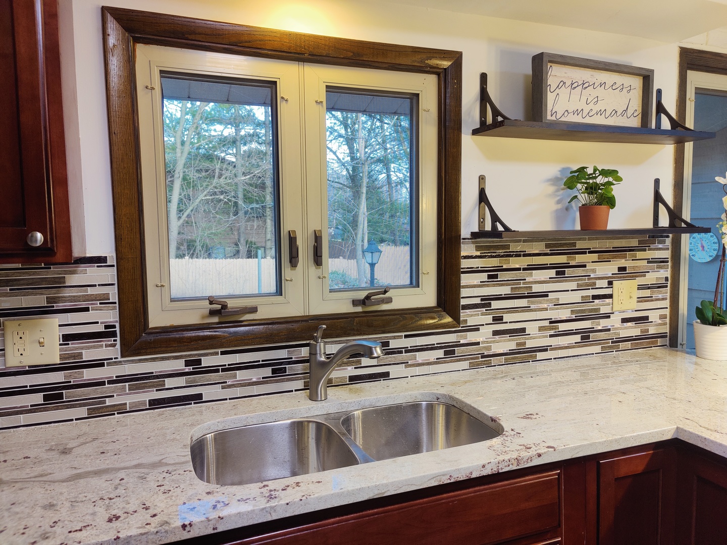 26605 West Wilmot Road Antioch, IL 60002 - Photo 5 of 30 a kitchen with stainless steel appliances a sink and a window
