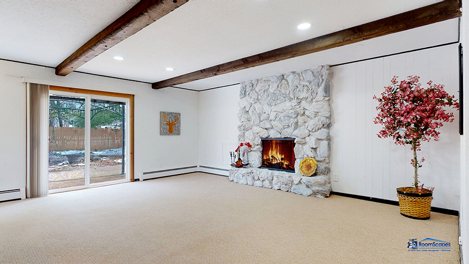 26605 West Wilmot Road Antioch, IL 60002 - Photo 10 of 30 a living room with furniture and a fireplace