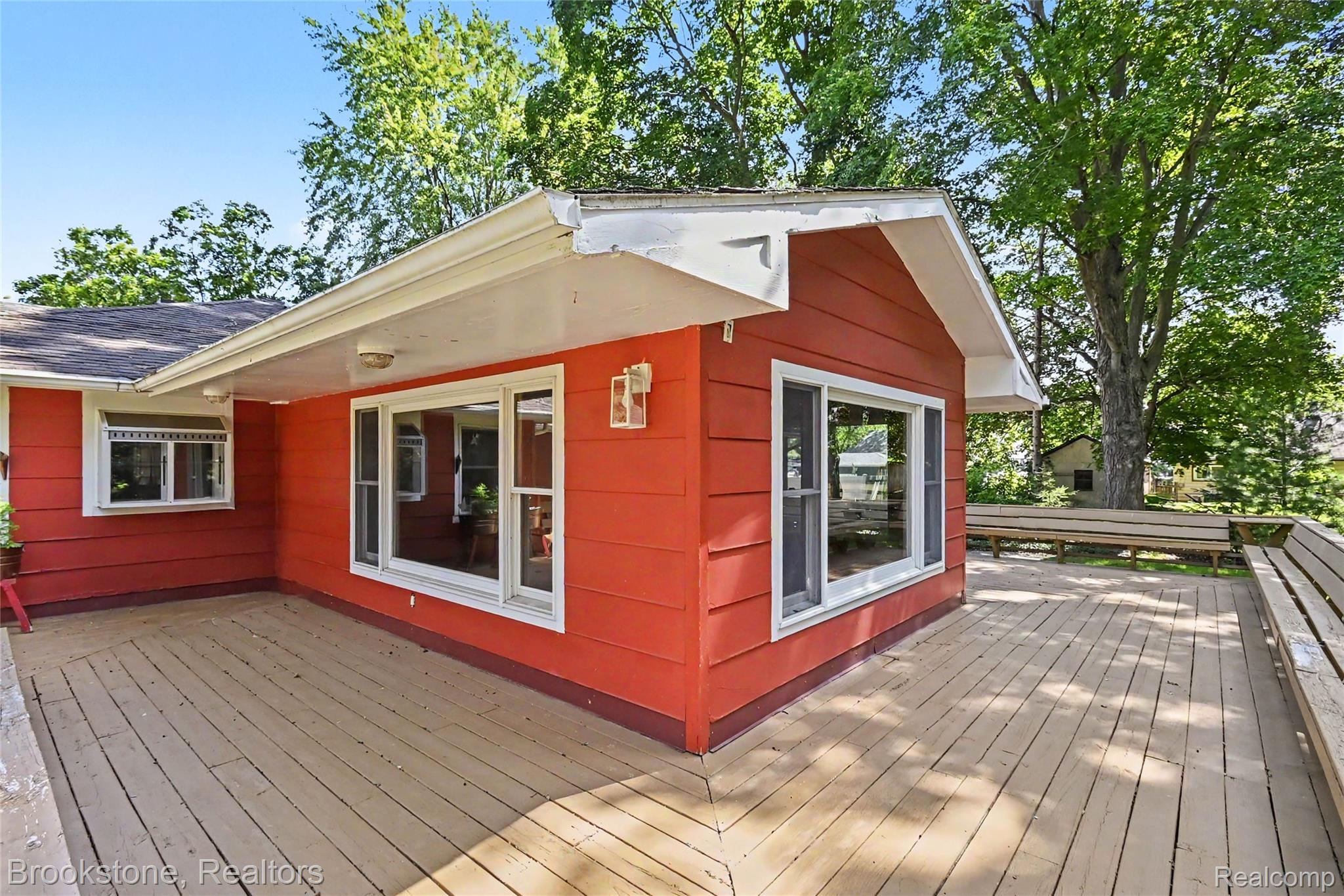 416 East Maple Street Mason, MI 48854 - Photo 15 of 18 Expansive outdoor deck featuring wood-finish flooring
