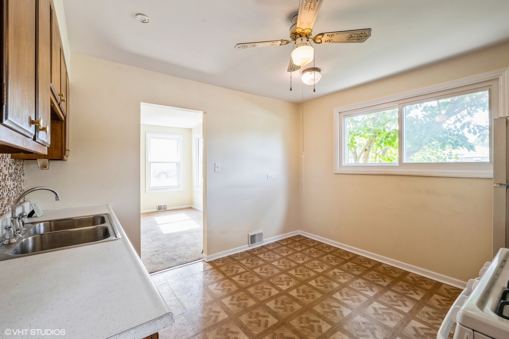 4541 Butterfield Road Hillside, IL 60162 - Photo 3 of 16 a bathroom with a sink and a window