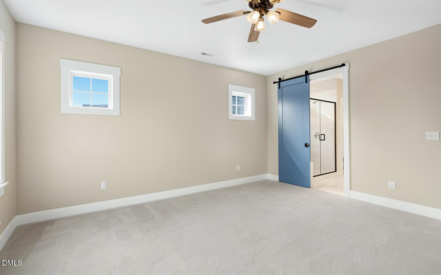 1105 Logperch Way Wendell, NC 27591 - Photo 13 of 29 a view of an empty room with a chandelier fan