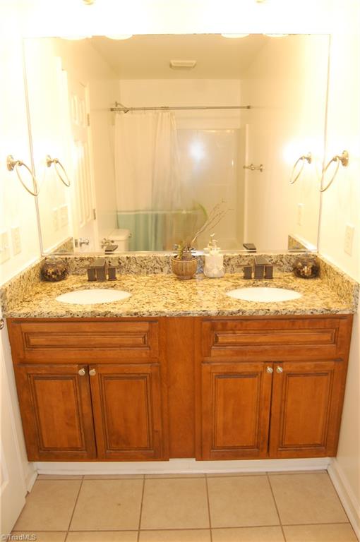 120 Oak Summit Road Winston-Salem, NC 27105 - Photo 15 of 29 Double vanity in primary bath