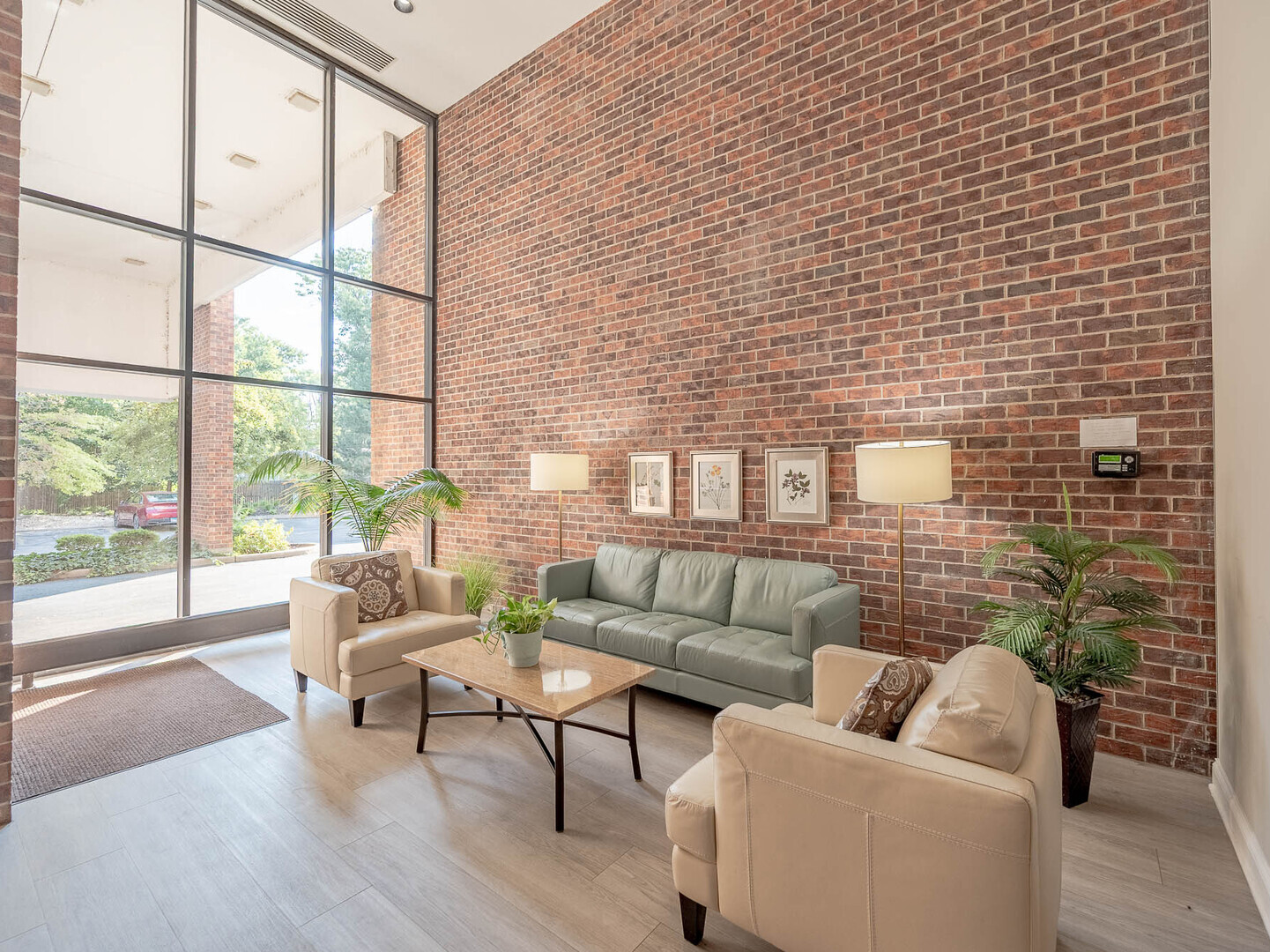 6545 Main Street, Unit 408 Downers Grove, IL 60516 - Photo 2 of 13 a living room with furniture and a floor to ceiling window