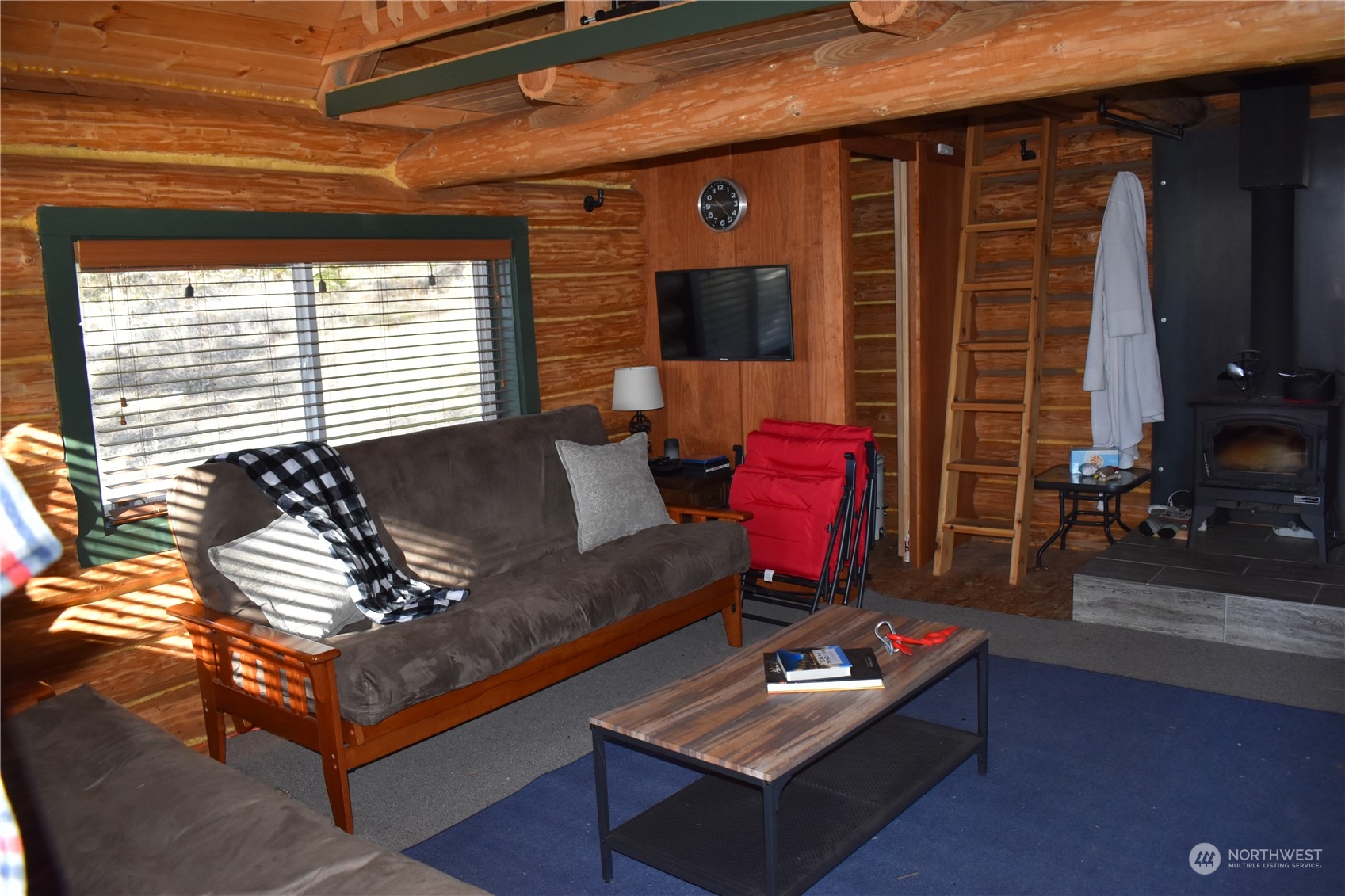 100 Lone Pine Trail Riverside, WA 98849 - Photo 16 of 37 a living room with furniture and a window