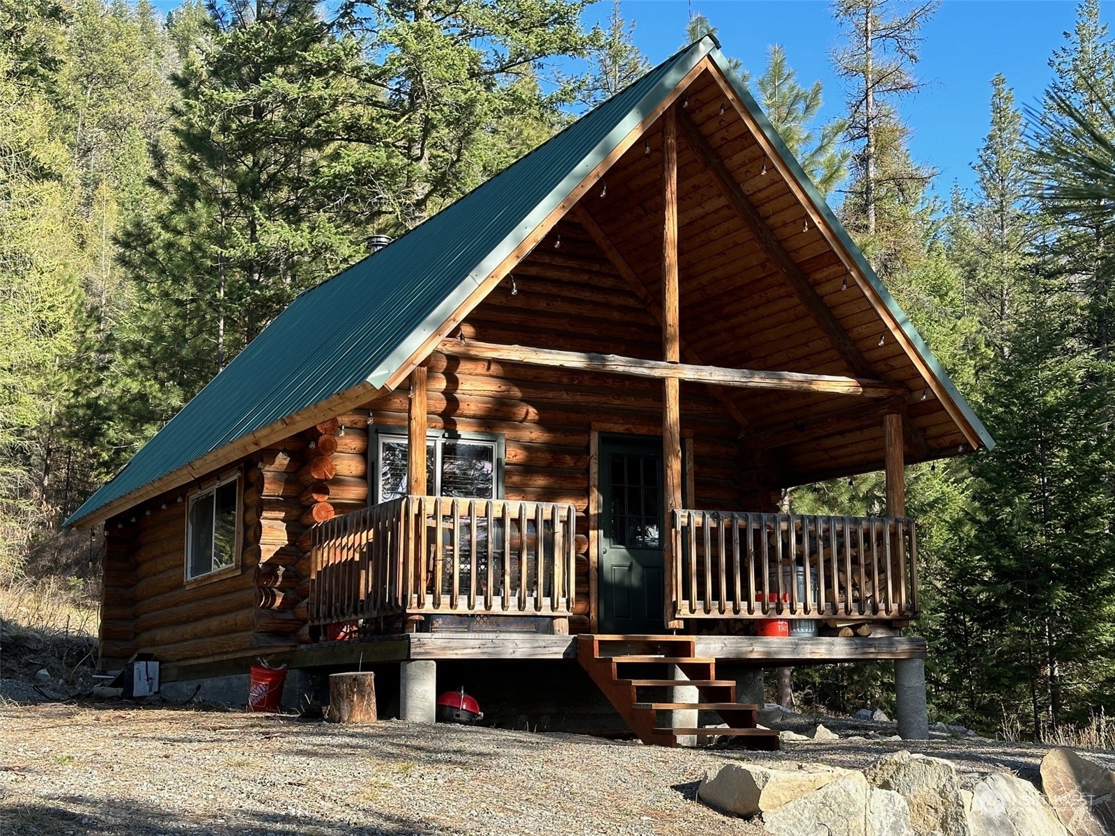 100 Lone Pine Trail Riverside, WA 98849 - Photo 2 of 37 a view of a house with a yard