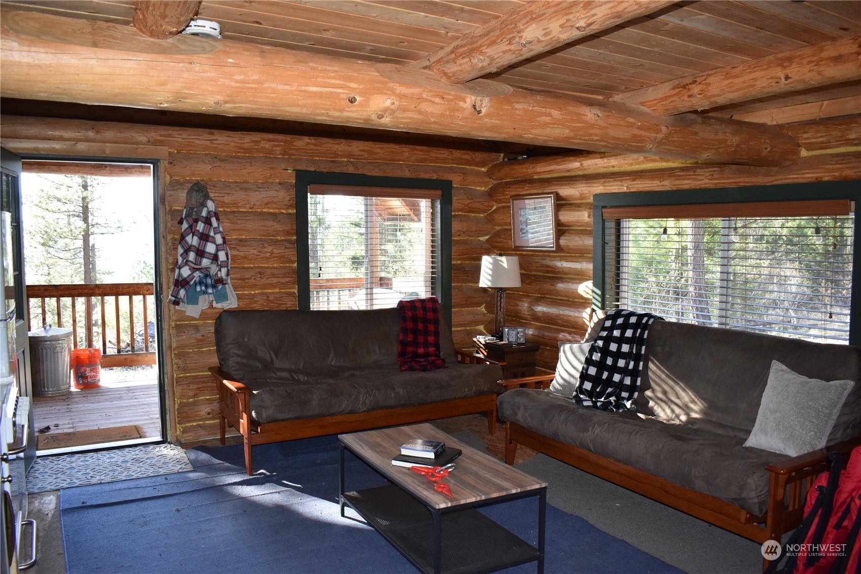 100 Lone Pine Trail Riverside, WA 98849 - Photo 5 of 37 a living room with furniture and a large window