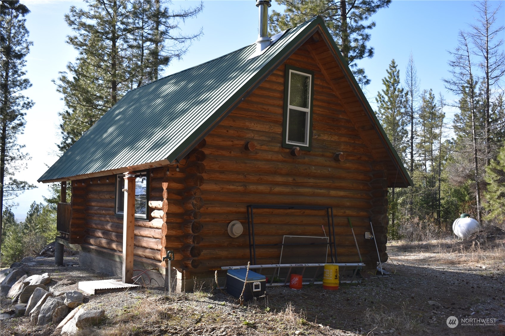 100 Lone Pine Trail Riverside, WA 98849 - Photo 6 of 37 a backyard of a house with seating space