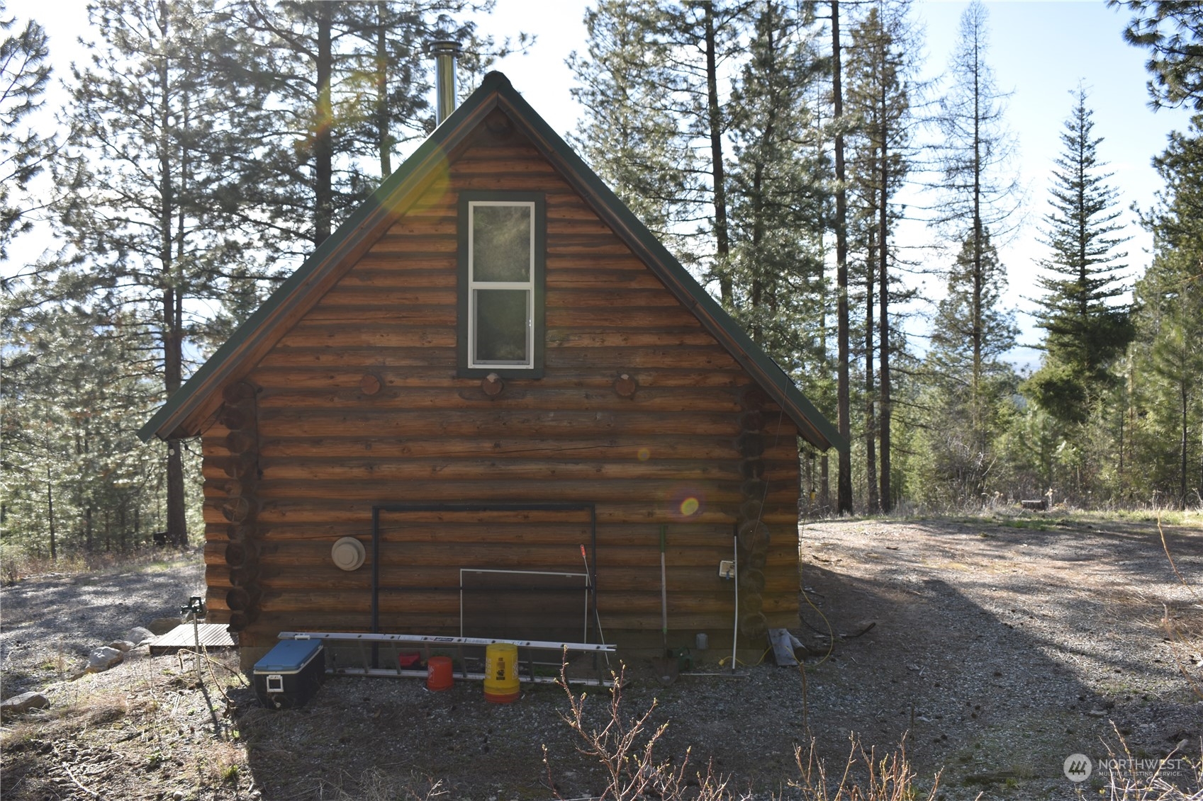 100 Lone Pine Trail Riverside, WA 98849 - Photo 7 of 37 a view of a small house with backyard