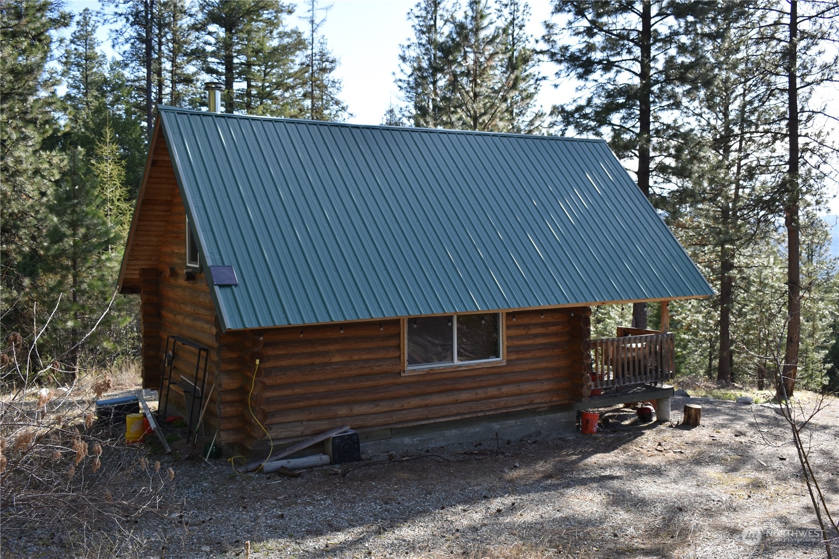 100 Lone Pine Trail Riverside, WA 98849 - Photo 9 of 37 a view of a house with a yard chairs and wooden fence
