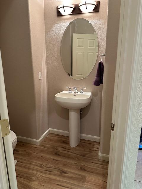 121 Quail Meadow Lane Copperopolis, CA 95228 - Photo 19 of 24 a bathroom with a sink toilet and mirror