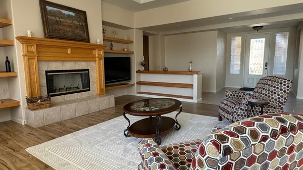a view of a closet and a mirror