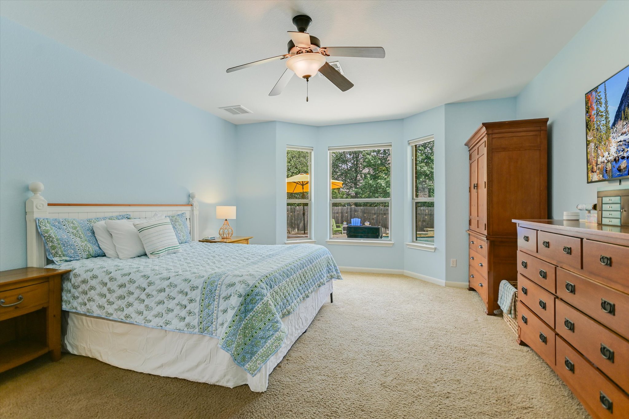 12312 Montclair Bend Austin, TX 78732 - Photo 19 of 40 Spacious primary bedroom on main level