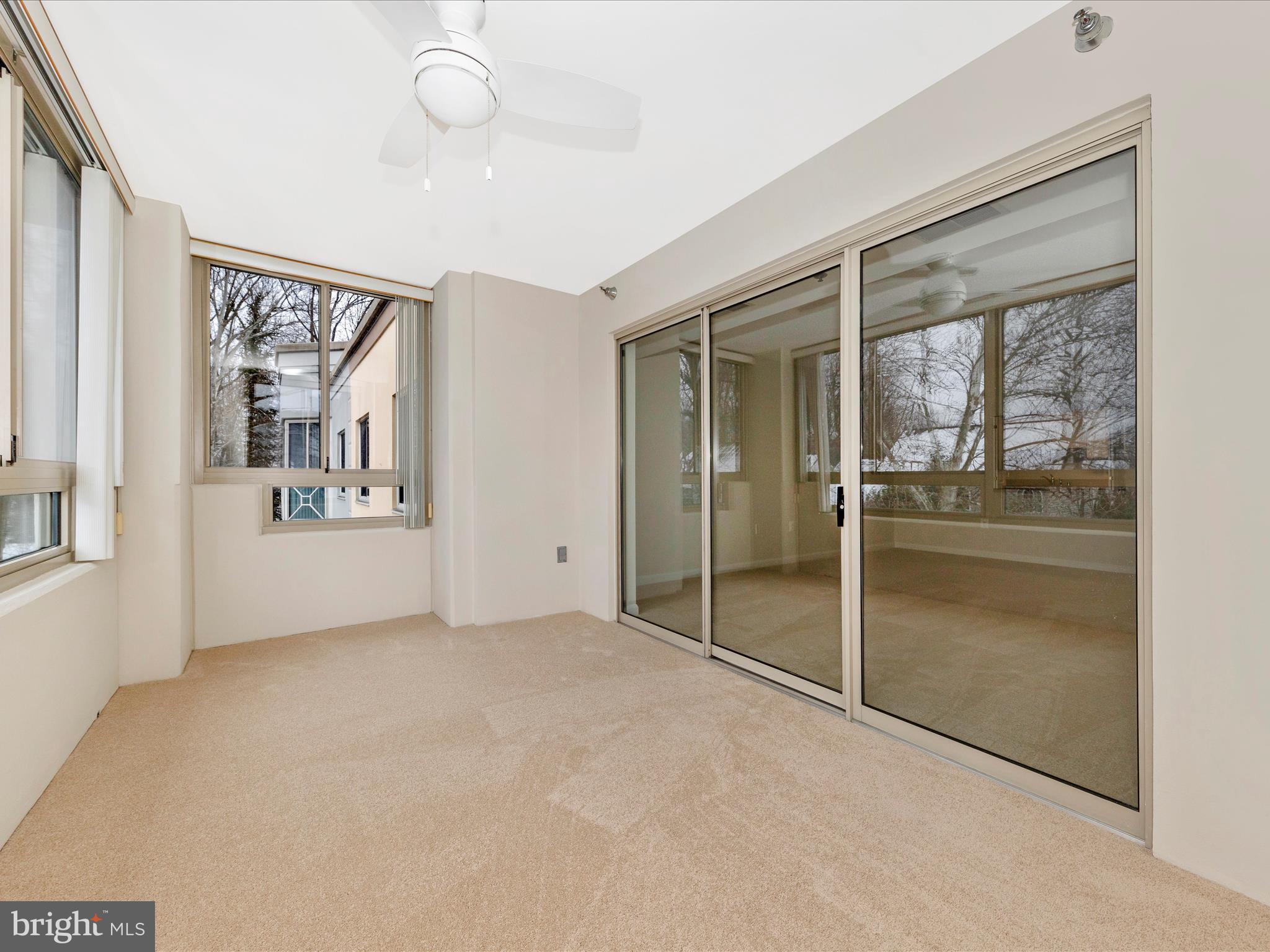 14809 Pennfield Circle, Unit 402 Silver Spring, MD 20906 - Photo 22 of 59 a view of an empty room with a window