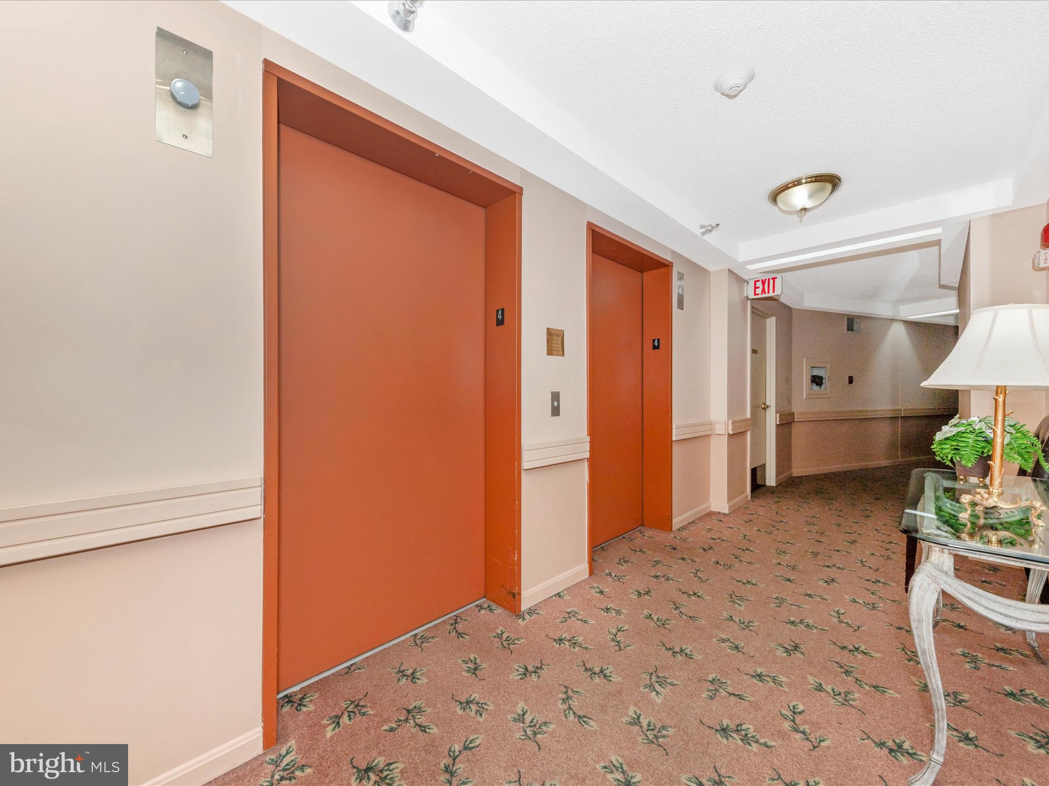 14809 Pennfield Circle, Unit 402 Silver Spring, MD 20906 - Photo 24 of 59 a bedroom with a bed and a window
