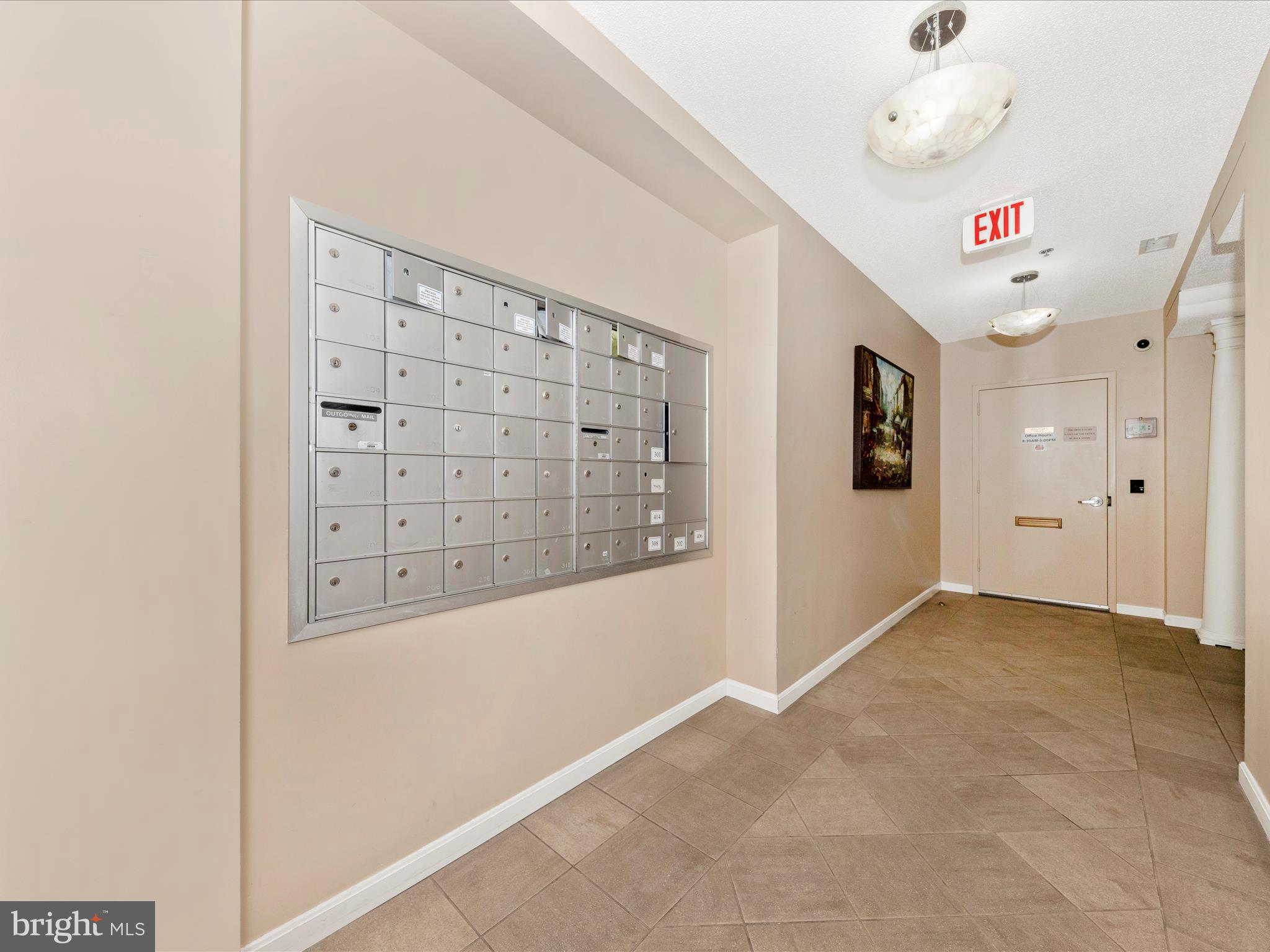 14809 Pennfield Circle, Unit 402 Silver Spring, MD 20906 - Photo 26 of 59 a view of an empty room with window and cabinet