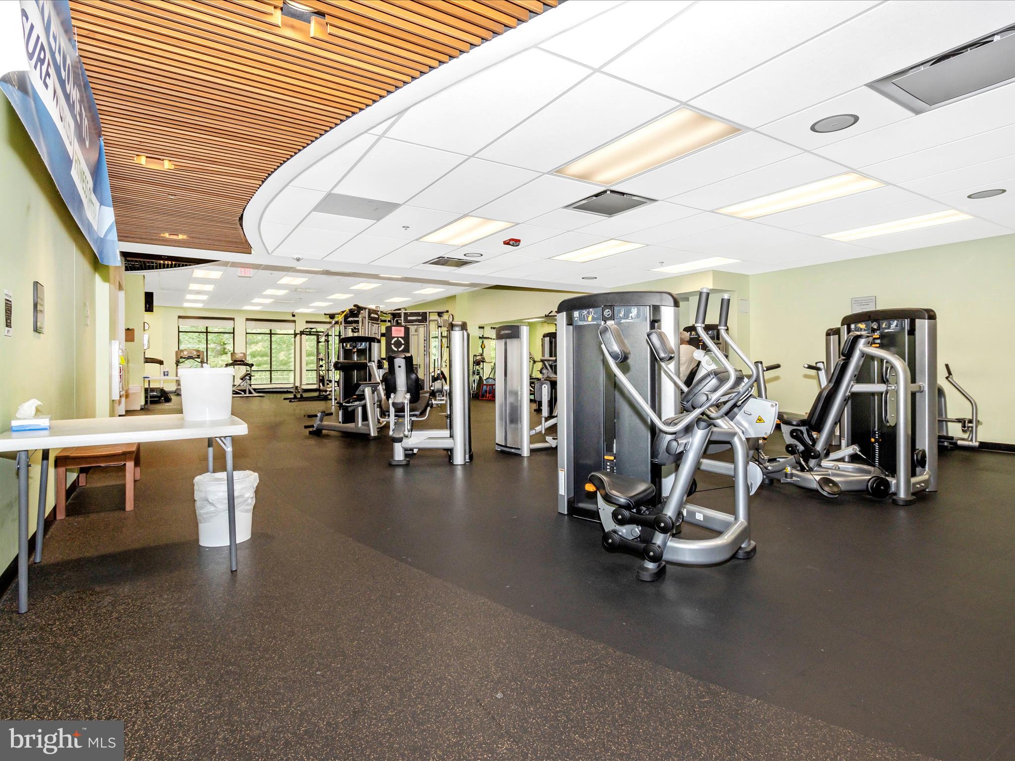 14809 Pennfield Circle, Unit 402 Silver Spring, MD 20906 - Photo 35 of 59 a view of a room with gym equipment