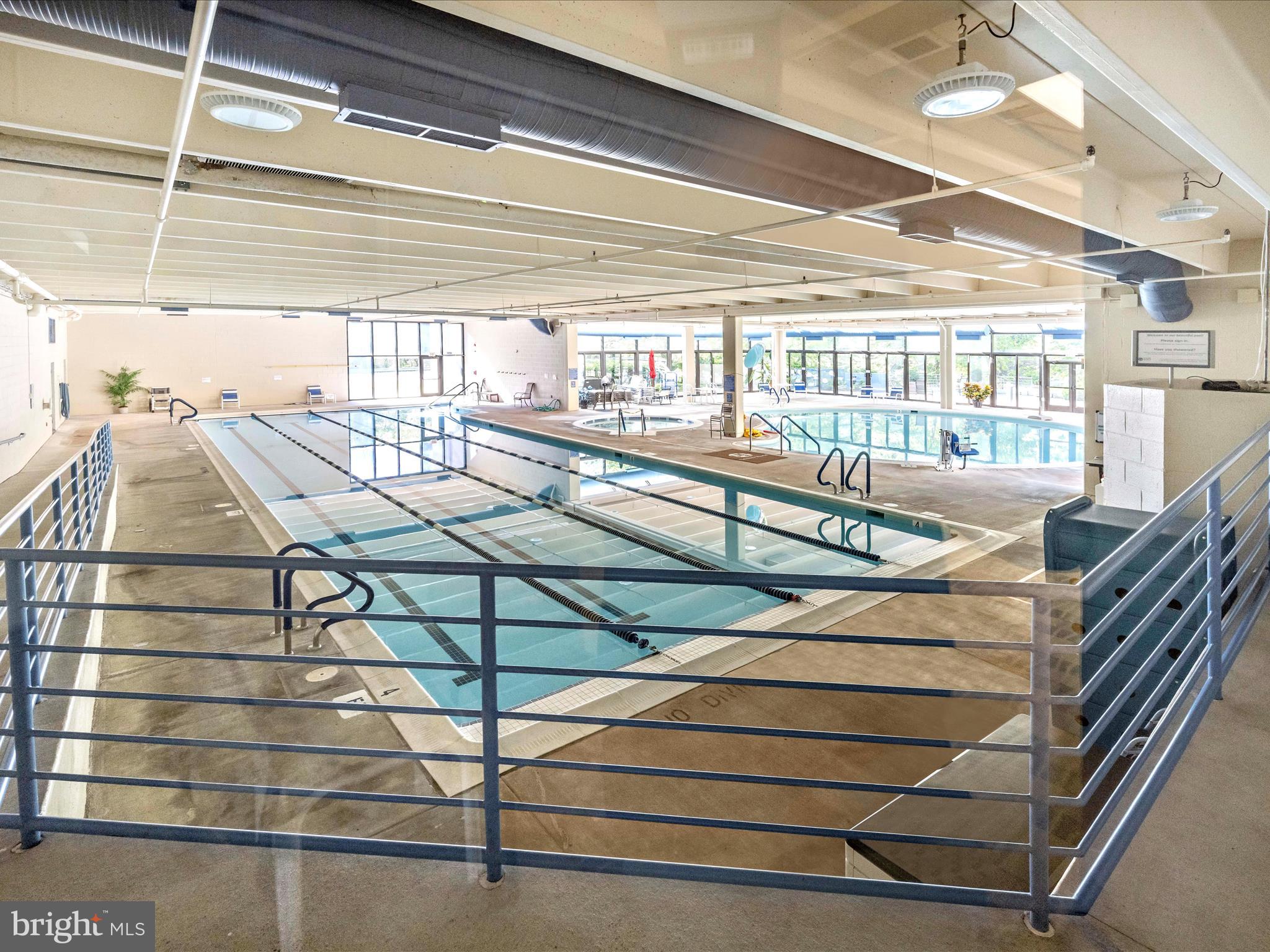 14809 Pennfield Circle, Unit 402 Silver Spring, MD 20906 - Photo 48 of 59 a view of a balcony with chairs