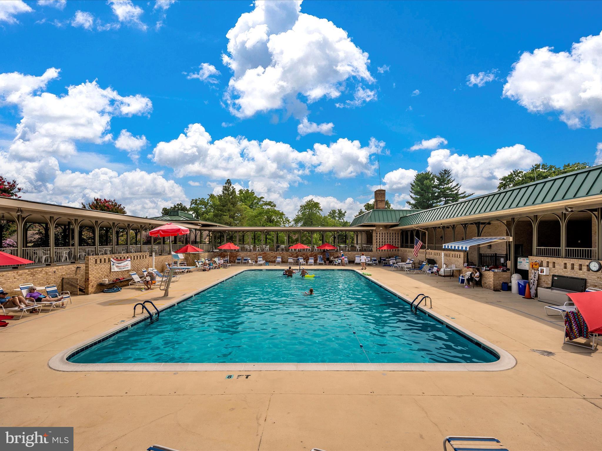 14809 Pennfield Circle, Unit 402 Silver Spring, MD 20906 - Photo 49 of 59 a view of a swimming pool with furniture