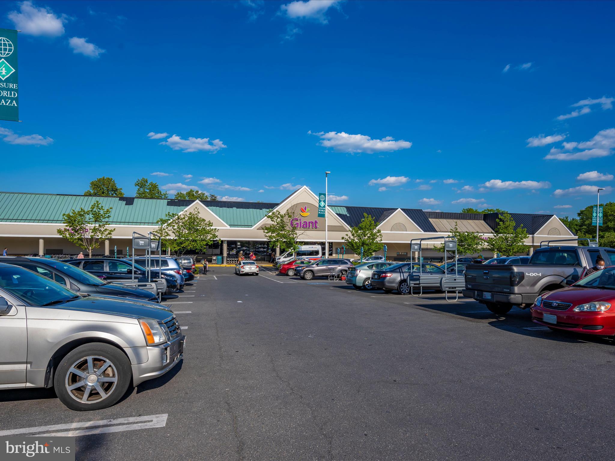 14809 Pennfield Circle, Unit 402 Silver Spring, MD 20906 - Photo 58 of 59 a view of a cars park in front of a house
