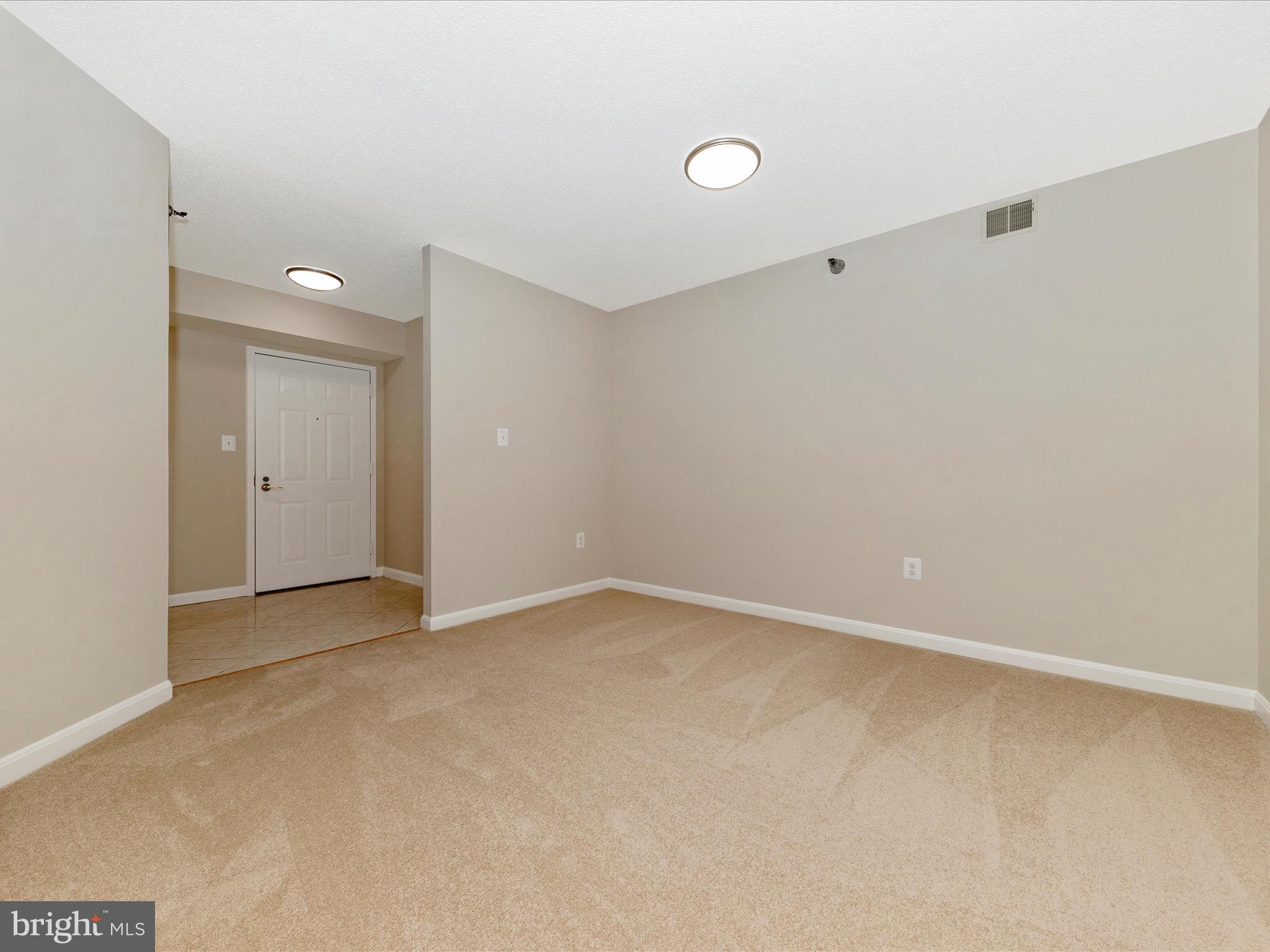 14809 Pennfield Circle, Unit 402 Silver Spring, MD 20906 - Photo 7 of 59 a view of an empty room