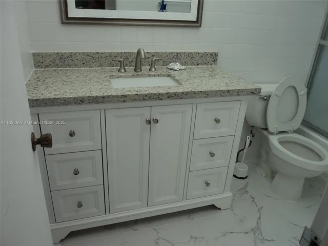 $440,000 | 1050 93rd Street, Unit 6F, Bay Harbor Islands, FL 33154