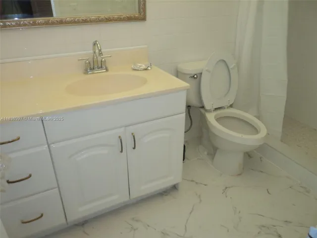 $440,000 | 1050 93rd Street, Unit 6F, Bay Harbor Islands, FL 33154