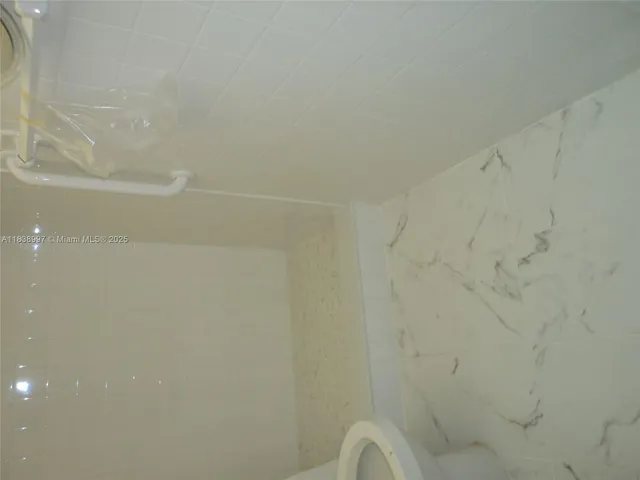 $440,000 | 1050 93rd Street, Unit 6F, Bay Harbor Islands, FL 33154