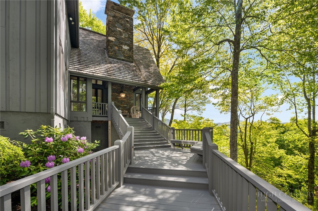 246 Mulberry Lane Boone, NC 28607 - Photo 1 of 49 a view of a house with wooden fence