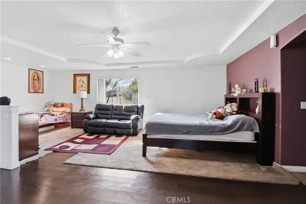 a living room with furniture rug and window