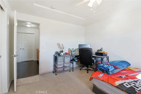 a room with a large bed and a large window