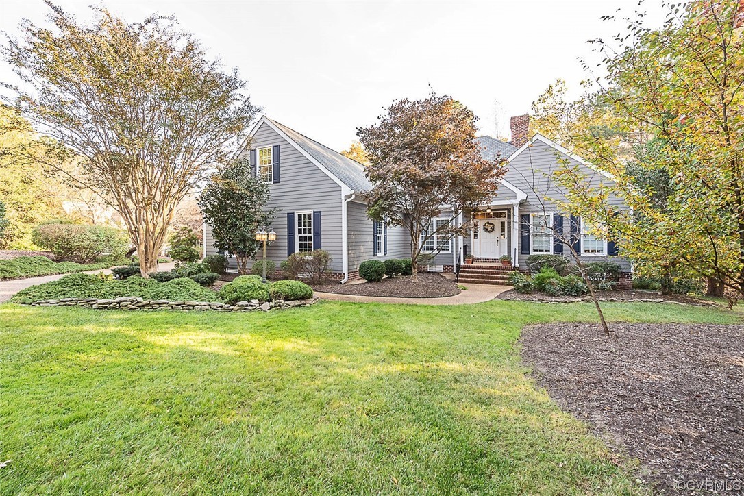 113 Grenelefe Williamsburg, VA 23188 - Photo 2 of 44 a view of a house with a backyard and a tree