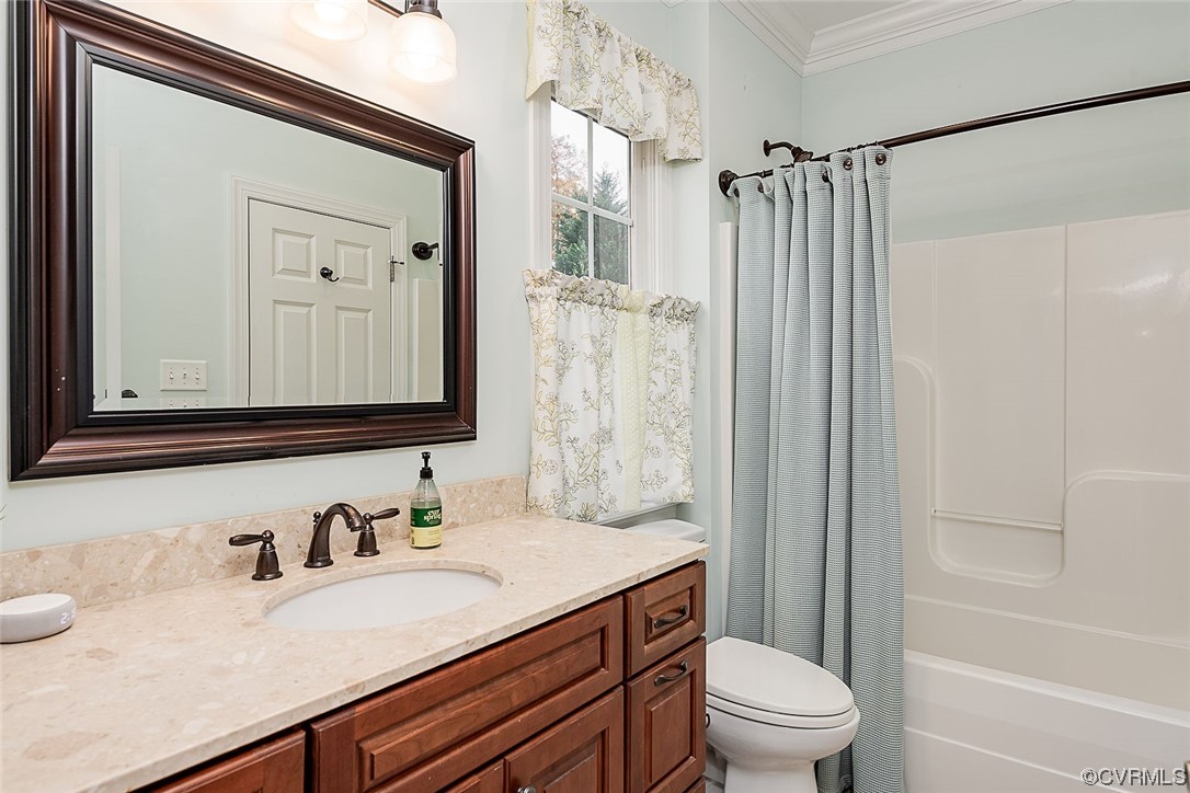 113 Grenelefe Williamsburg, VA 23188 - Photo 24 of 44 a bathroom with a granite countertop sink toilet a mirror a vanity and shower