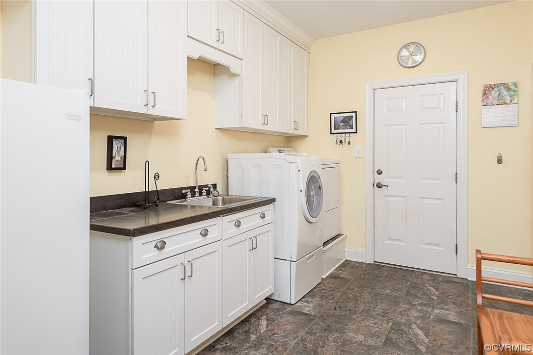 113 Grenelefe Williamsburg, VA 23188 - Photo 29 of 44 a kitchen with stainless steel appliances granite countertop a sink stove and refrigerator