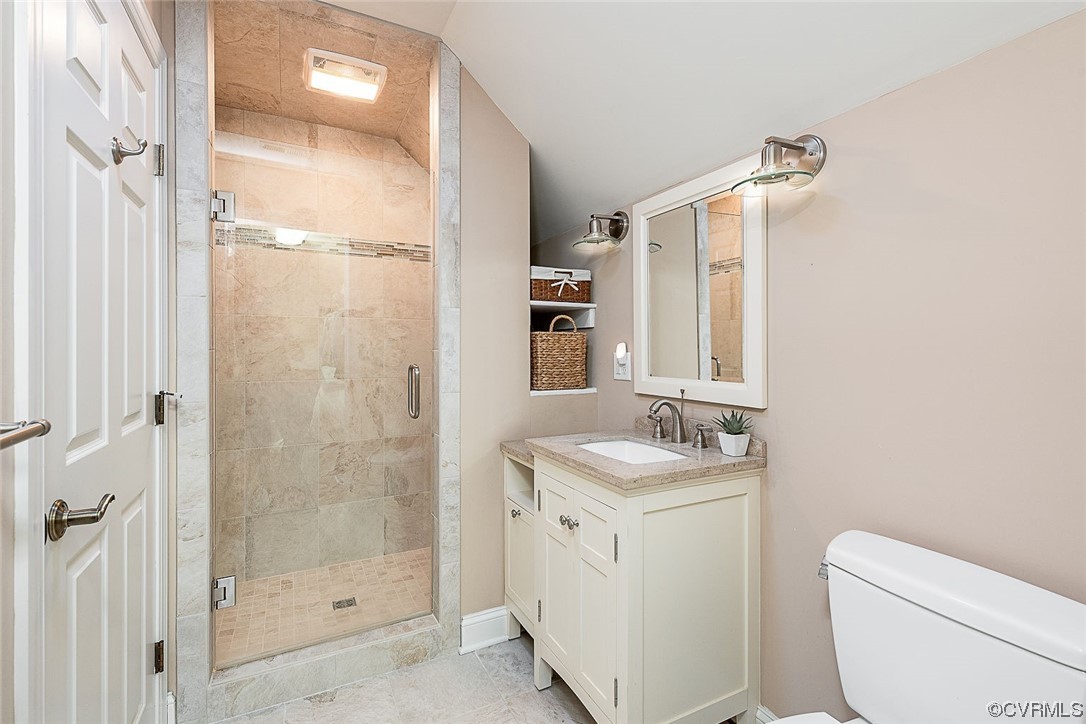 113 Grenelefe Williamsburg, VA 23188 - Photo 32 of 44 a bathroom with a granite countertop sink toilet and shower
