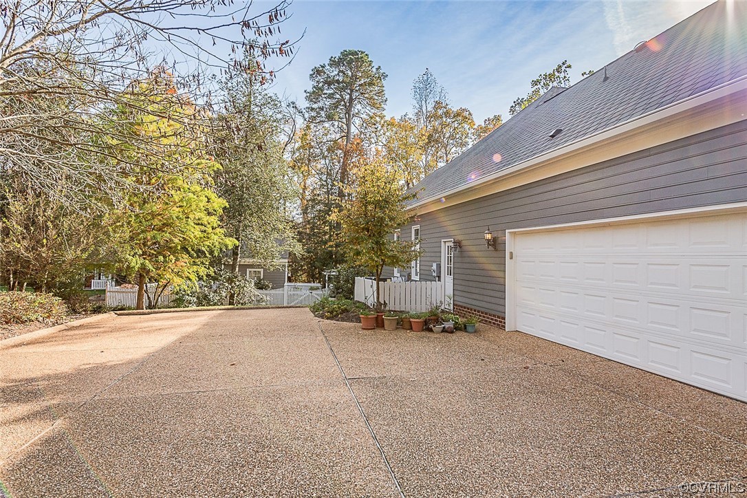 113 Grenelefe Williamsburg, VA 23188 - Photo 33 of 44 a view of a house with a yard and garage