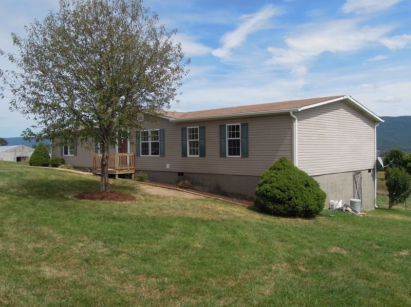 781 Concord Church Road Timberville, VA 22853 - Photo 1 of 18 a view of a house with backyard and garden