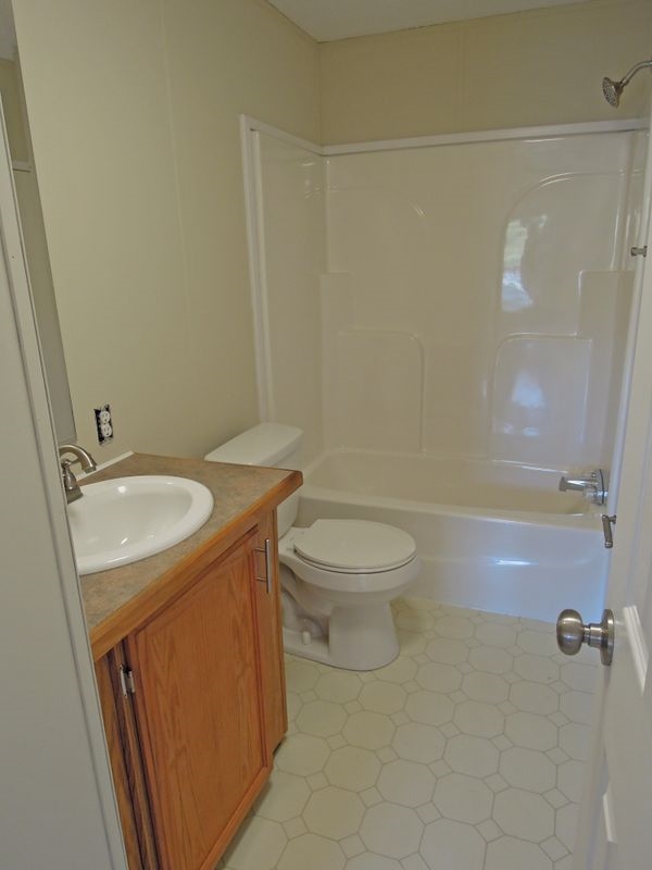 781 Concord Church Road Timberville, VA 22853 - Photo 12 of 18 a bathroom with a sink a toilet and shower