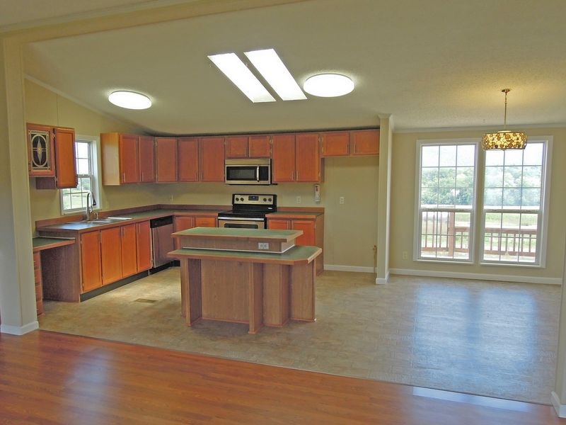 781 Concord Church Road Timberville, VA 22853 - Photo 3 of 18 a kitchen with stainless steel appliances granite countertop a stove a sink dishwasher and a refrigerator