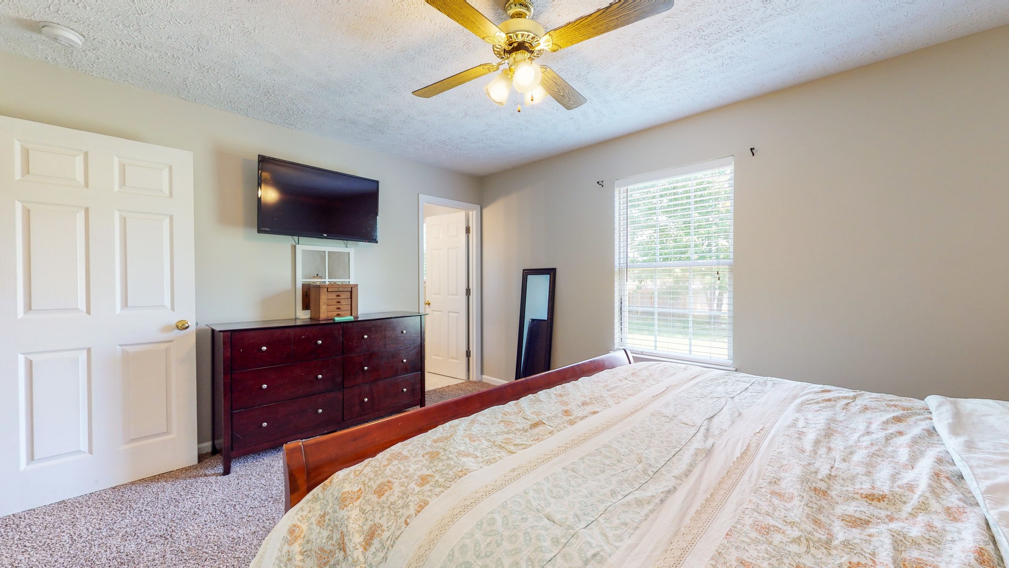 3718 Maple Lane Murfreesboro, TN 37129 - Photo 11 of 30 a bedroom with a bed and a flat screen tv