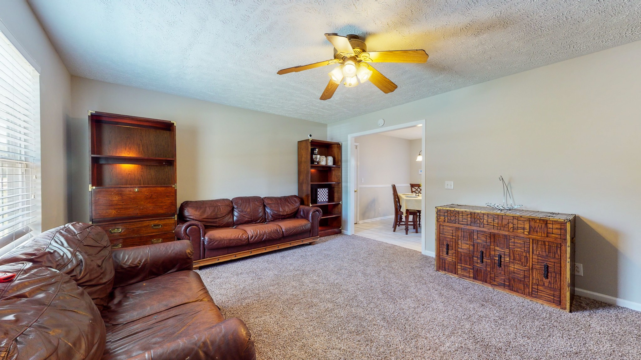 3718 Maple Lane Murfreesboro, TN 37129 - Photo 4 of 30 a living room with furniture and a chandelier
