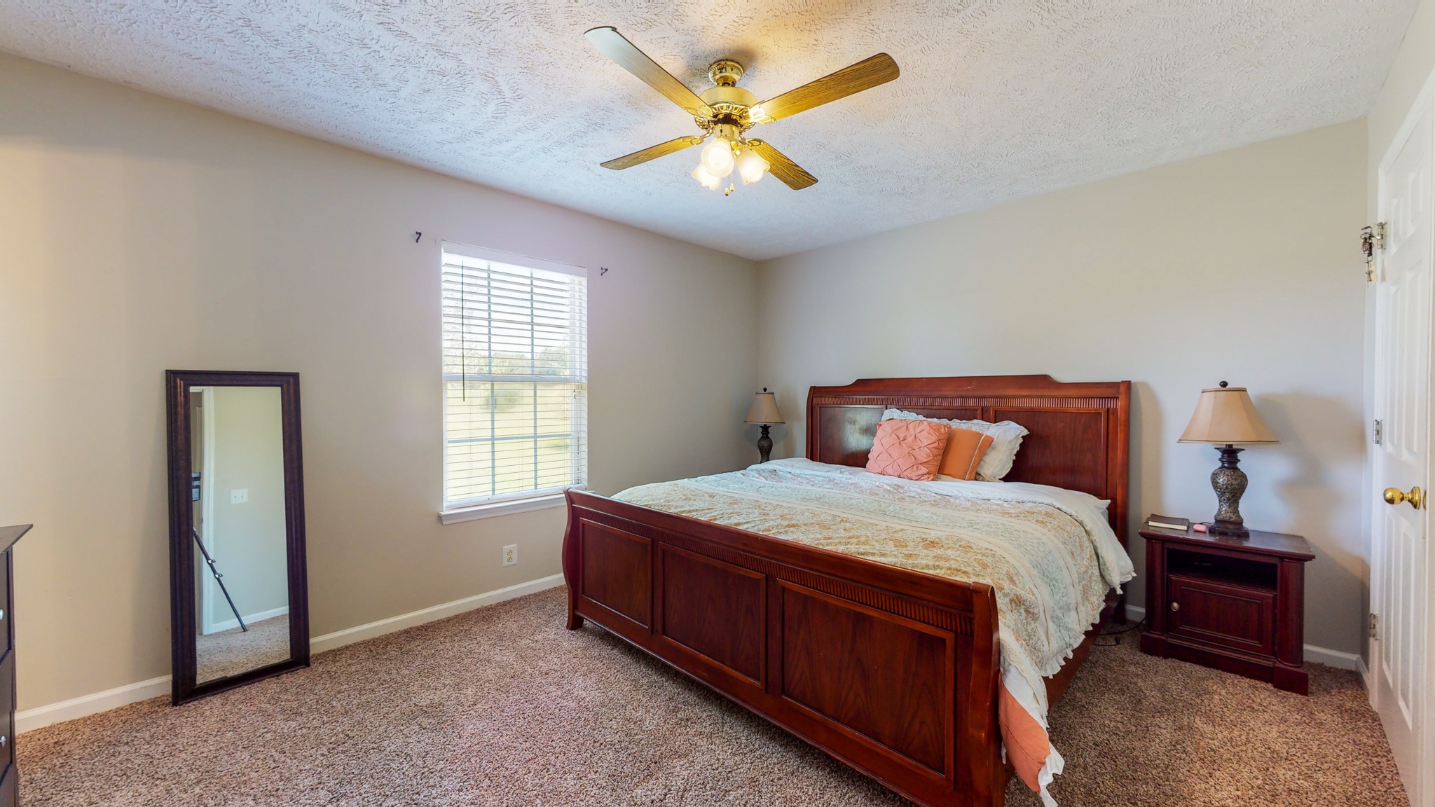 3718 Maple Lane Murfreesboro, TN 37129 - Photo 10 of 30 a bedroom with a bed and a ceiling fan