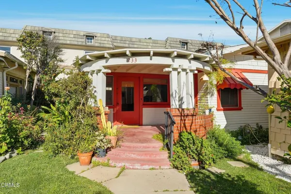 a front view of a house with a porch
