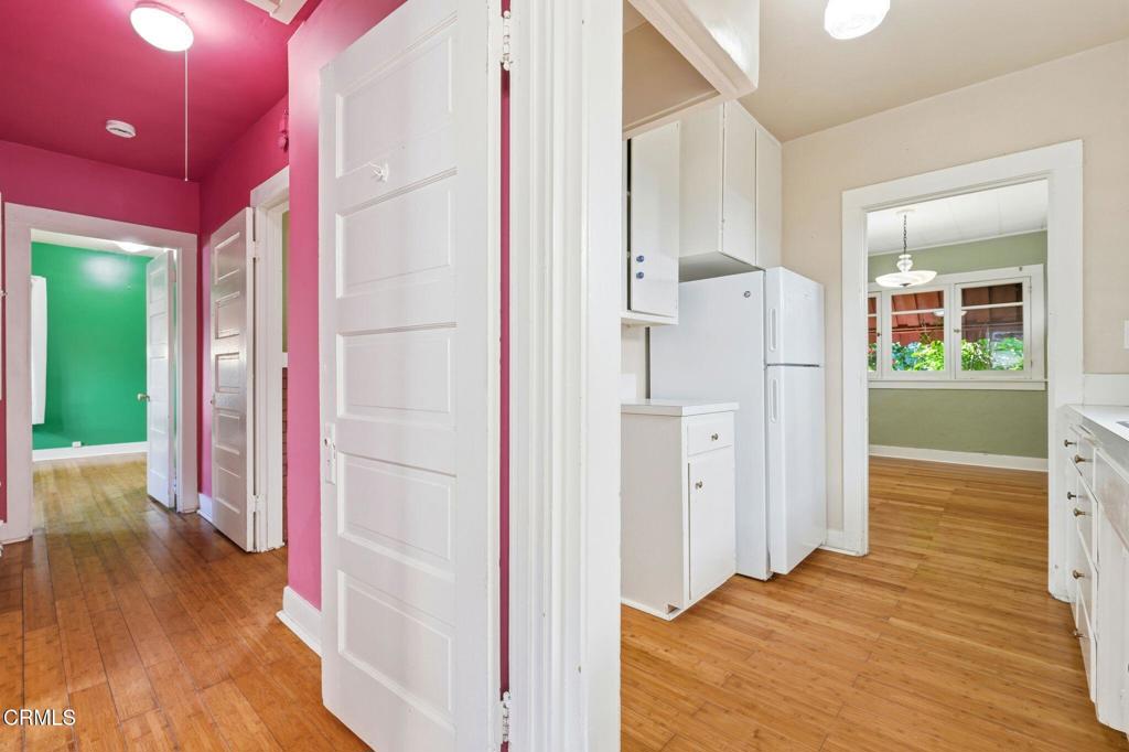 233 Ohio Street Pasadena, CA 91106 - Photo 15 of 22 a view of a hallway with wooden floor and entryway