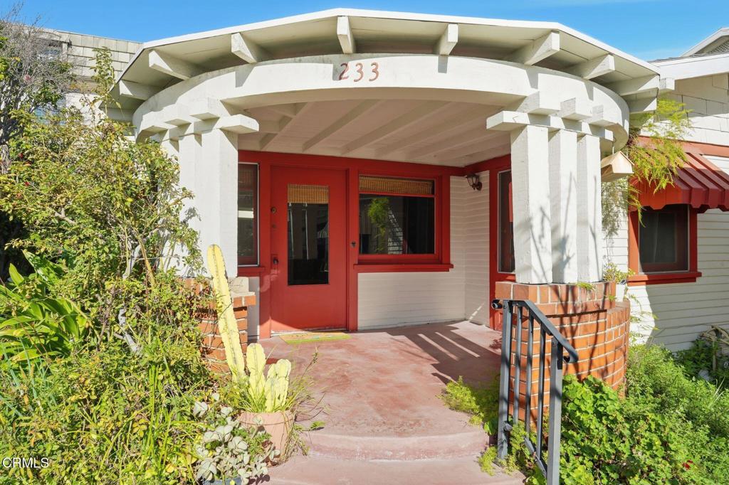 233 Ohio Street Pasadena, CA 91106 - Photo 3 of 22 a front view of a house with yard
