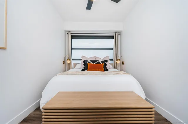 a view of a dining room with furniture and window