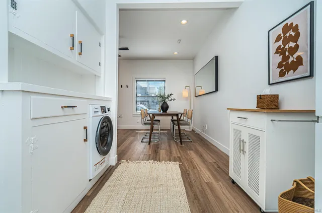 a view of entryway with wooden floor