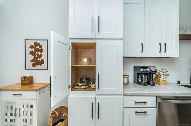 a bedroom with bed and wooden floor