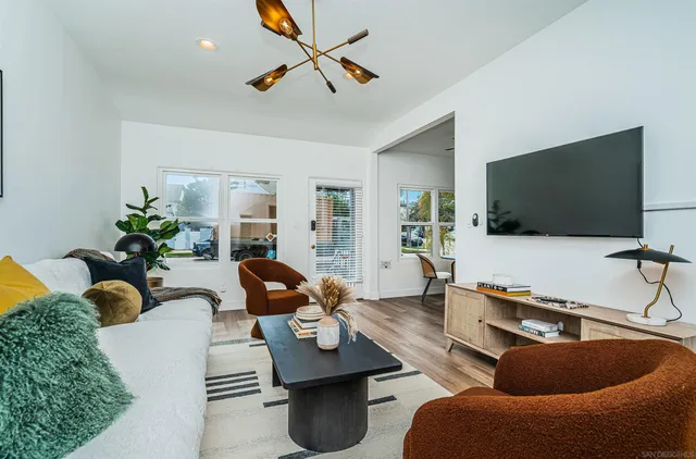 a view of living room and patio