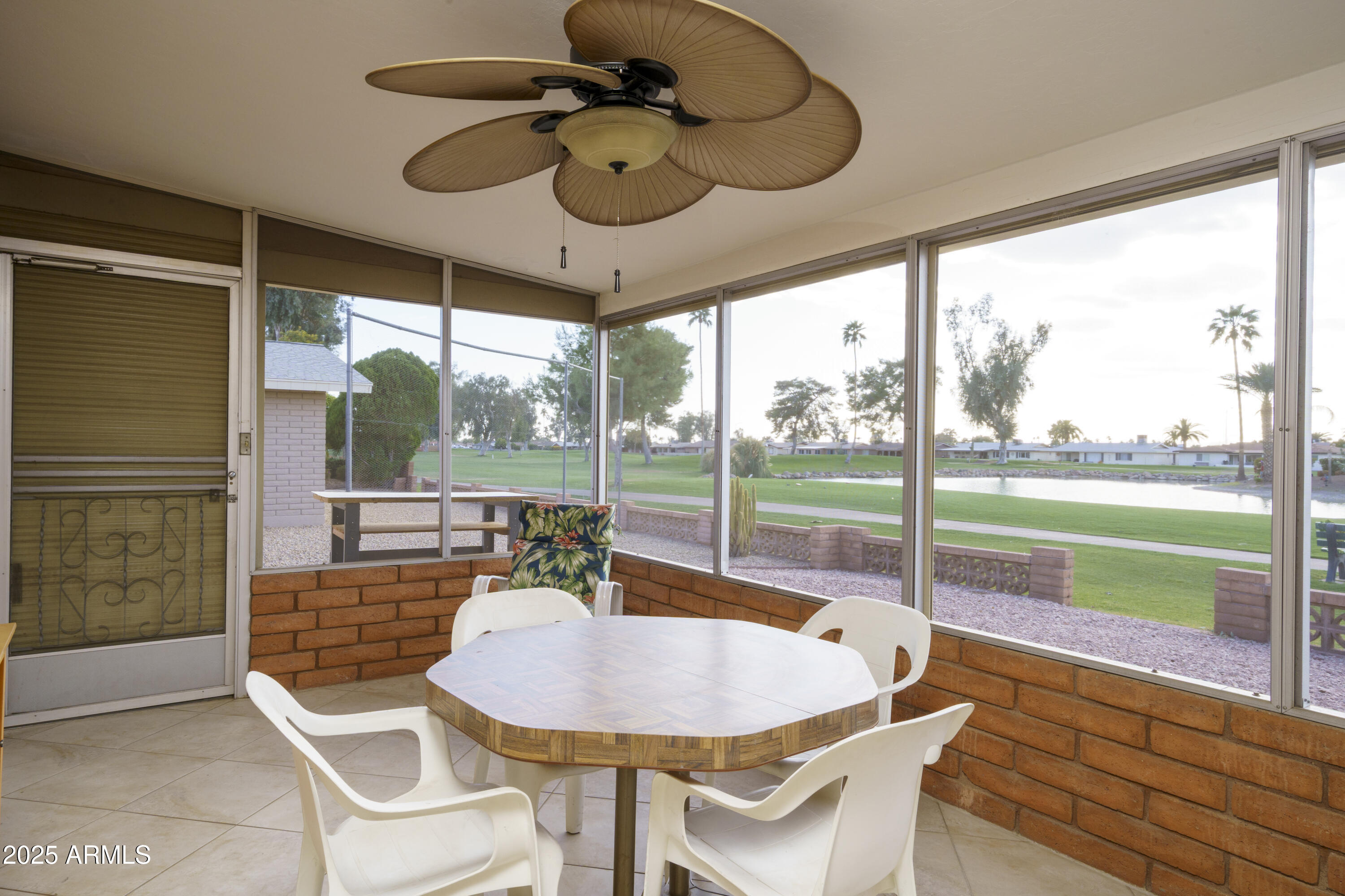 518 South Racine Mesa, AZ 85206 - Photo 20 of 24 a dining room with furniture a chandelier and outdoor view