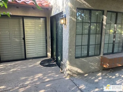a front view of a house with a garage
